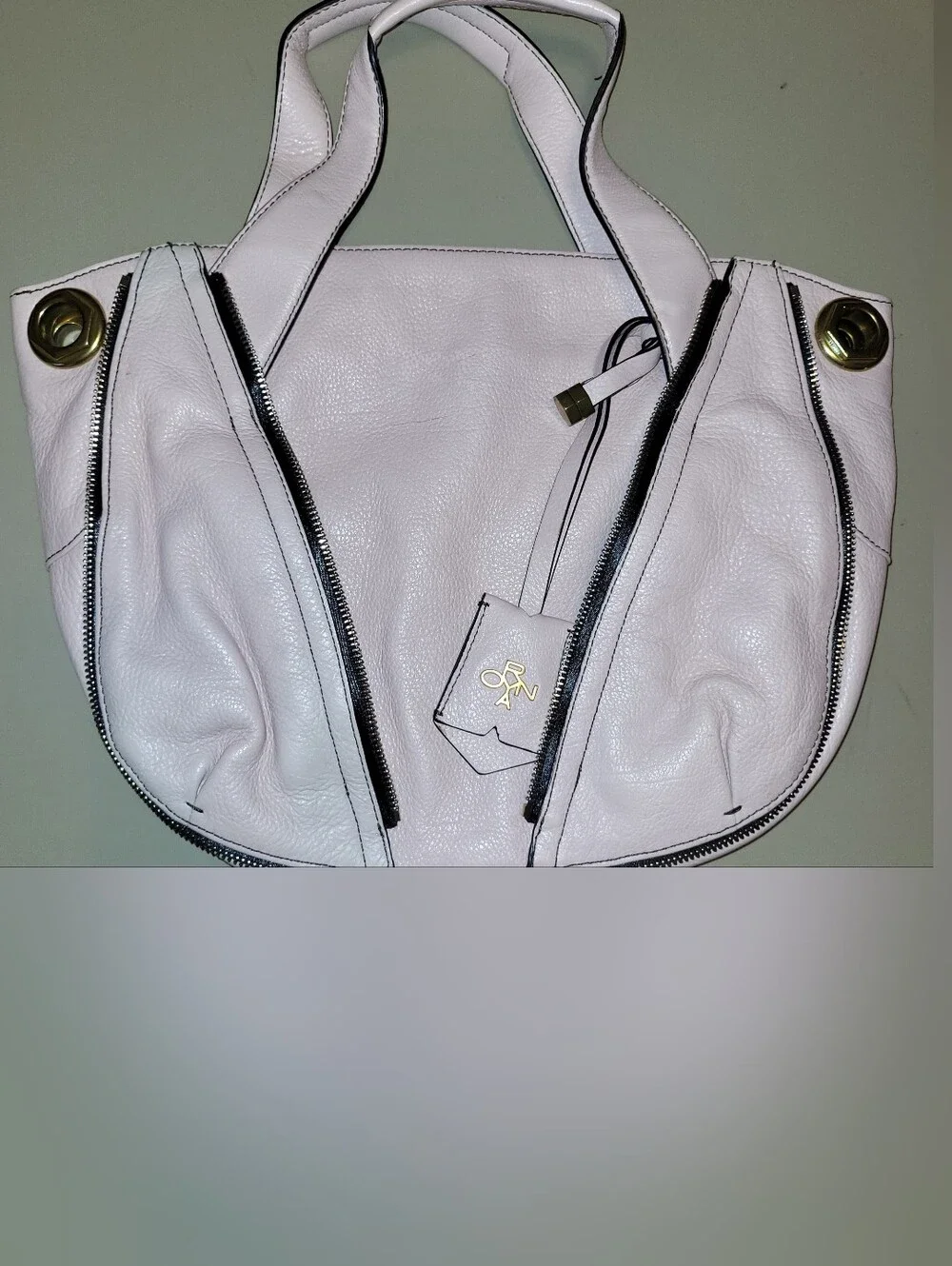 Oryany Blush Leather Shoulder Bag with Gold Turn-Lock Top Zip Bag.